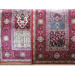 Pair of Kashmir runners the panel design upon a red ground, 150 x 70cm (2)