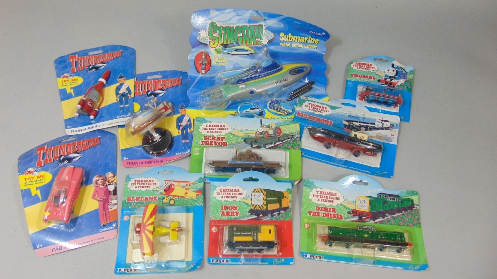 Box of collectable Carlton and Britt toys in original packaging including Stingray submarine,