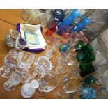 A large mixed collection of glassware to include green glass goblets, an attractive glass jug with