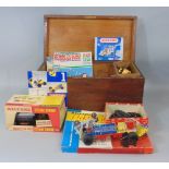 Wooden trunk containing a collection of Meccano including steam engine, clockwork & electric