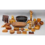 A collection of treen including a turned wood bowl, an Indian printing block, further turned wood