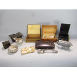 A box of interesting items to include a cast steel perpetual day calendar, various Eastern boxes,