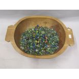 A 19th century dairy bowl containing several hundred marbles or various sizes