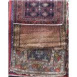 An Afghan runner, Persian runner and floral carpet of varying designs and sizes (3)