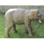 A large fibreglass model of an elephant with well detailed features, 100 cm in height approx