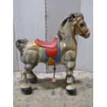 A Mobo tin plate horse with galloping action and original painted finish