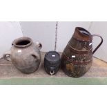 A Georgian oak and steel banded flagon with loop handle, farm workers cider barrel, early terracotta