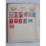 Two albums containing a quantity of British and worldwide stamps, including a number from Argentina,