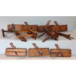 A selection of woodworking planes including moulding and plough examples; together with two