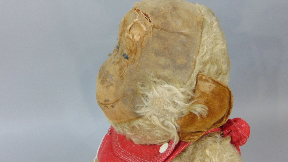Toy chimpanzee, early 20th century with straw stuffing, articulating limbs, glass eyes and velveteen - Image 4 of 4