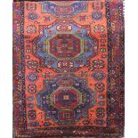 Persian Old Caucasian rug, with unique cross medallion design, red ground, 220 x 135cm