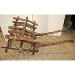 A Victorian child's hand/dog cart in timber with wire wheels