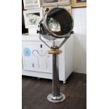 Floor standing search lights/lamp with polished steel casing and brass fittings, 110 cm high approx