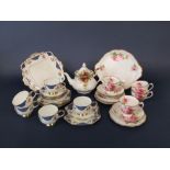 A collection of Royal Albert American Beauty pattern tea wares comprising cake plate, four cups,