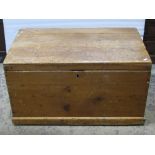 A stripped pine blanket chest with rising lid, one other with steel banded border and one other
