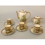 A collection of early 20th century Satsuma coffee wares with painted and gilded landscape decoration