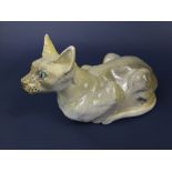 An unusual studio pottery model of a crouching Siamese cat with label to base Sophie March? and