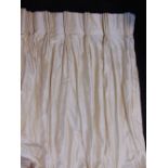 One pair of full length curtains in ivory dupion silk, lined and interlined with triple pleat