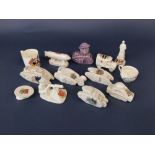 A collection of crested ceramic tanks, Arcadian model of Tommy and his machine gun, a purple