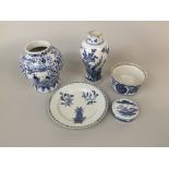 A collection of 19th century and other blue and white oriental ceramics including a vase of