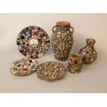 A collection of early 20th century mosaic wares, each composed of various vintage ceramic fragments,