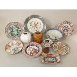 An interesting collection of 19th century and other oriental ceramics including an imari plate