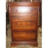 A Willis & Gambier hardwood tower of six drawers including a cushion moulded drawer within a