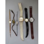 9ct ladies Tissot cocktail watch, champagne dialm baton markers, 9ct strap; with five further