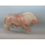 Tribal Interest - Carved soapstone figure of a standing lion, 35cm long