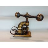 Good quality Victorian cast iron stud press with rotating handle and gilt highlights, 33cm high