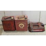 Two vintage fuel cans complete with screw caps including a Shell Mex example together with a further