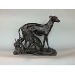 Cast spelter bronzed character group of a standing greyhound with further seated hound and various