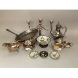 A mixed collection of metalware to include silver plated candelabra, various other silver plated