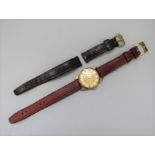1950s Smith's De Luxe 9ct gents wrist watch, the two tone gilt dial with Arabic numerals to 12, 2,
