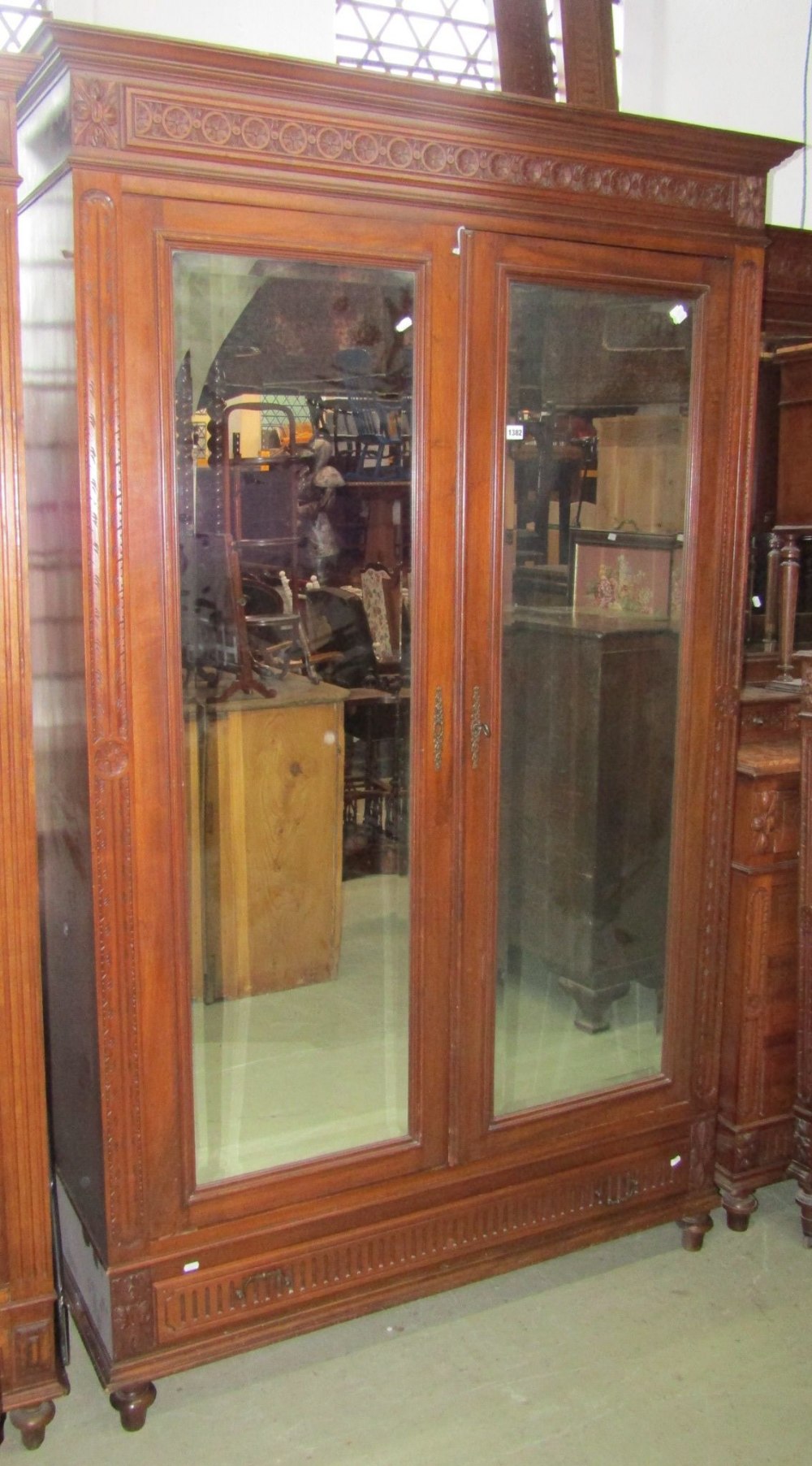 A good quality 19th century walnut four piece bedroom suite comprising a double wardrobe of