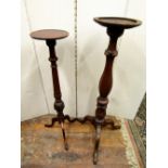 A 19th century mahogany torchere on a fluted vase shaped column and tripod base and one other