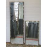 A pair of graduated wall mirrors with simulated bamboo moulded frames and silvered finish, 107cm x