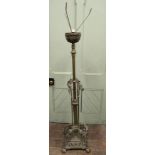 A good quality Victorian cast brass telescopic oil lamp stand raised on a square base with cast