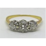 Good three stone diamond ring, centre stone 0.35cts approx, yellow metal unmarked, size K, 2.1g
