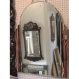 An art deco wall mirror with arched outline, framed within peach coloured glass border, 72cm max (