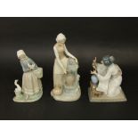 A Lladro figure of a Japanese woman arranging flowers, a further Lladro figure of a goose girl