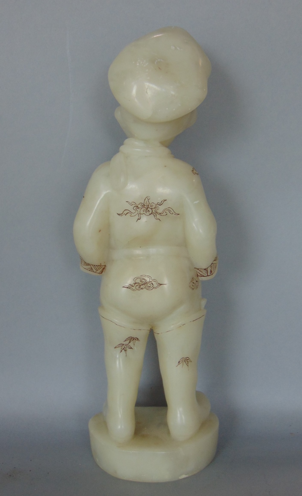 A Chinese cased soapstone study of a standing boy with shibayama type detail, the boy standing - Image 3 of 4