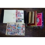 A mixed collection of stock books, stamp albums and unsorted loose stamps - British and worldwide (