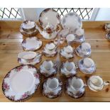 A collection of Royal Albert Concerto pattern wares comprising milk jug, sugar bowl, six saucers,