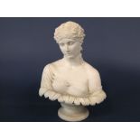 A 19th century Parian bust of a young woman in classical style drapery raised on a socle type base