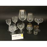 A large collection of mainly cut glassware to include tumblers, goblets, etc; together with