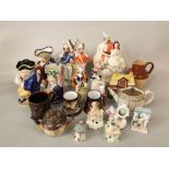 A collection of mainly 19th century Staffordshire wares including a military group of a pair of