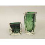 Matched graduated pair of mid-century green glass vases, with interesting incised decoration, marked