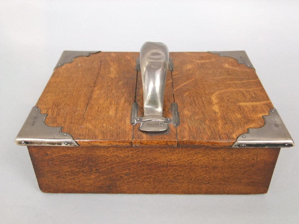 A Victorian oak and silver overlaid two divisional table top cigar box by Mapping & Webb London