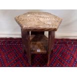 A small Japanese occasional table of hexagonal form with chrysanthemum detail